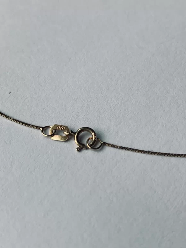 Gold necklace with charms - Image 3